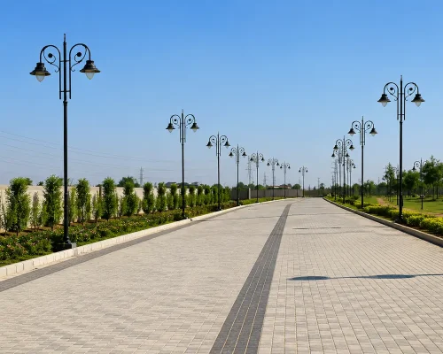 Landscaped internal road with street lamps at Eldeco Viviana Ludhiana
