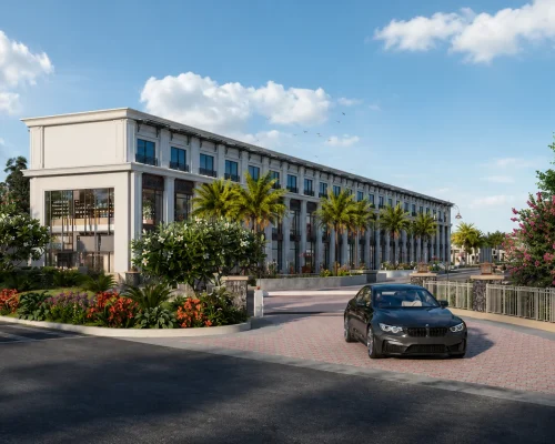 Retail building exterior with palm-lined driveway at Eldeco Viviana